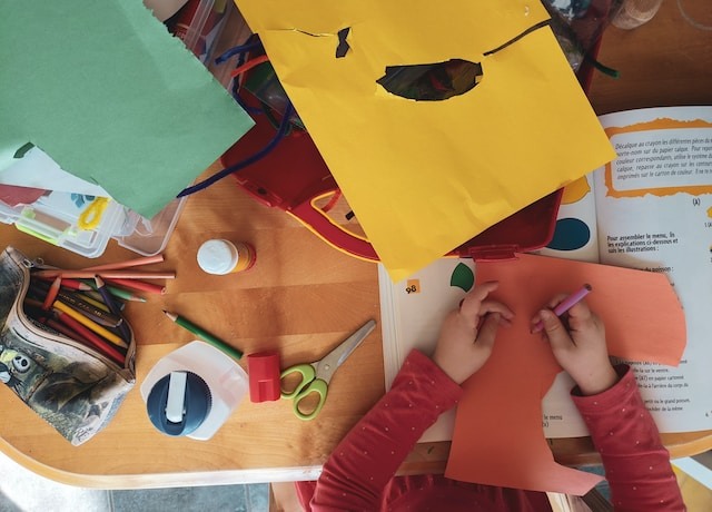 Young child making crafts