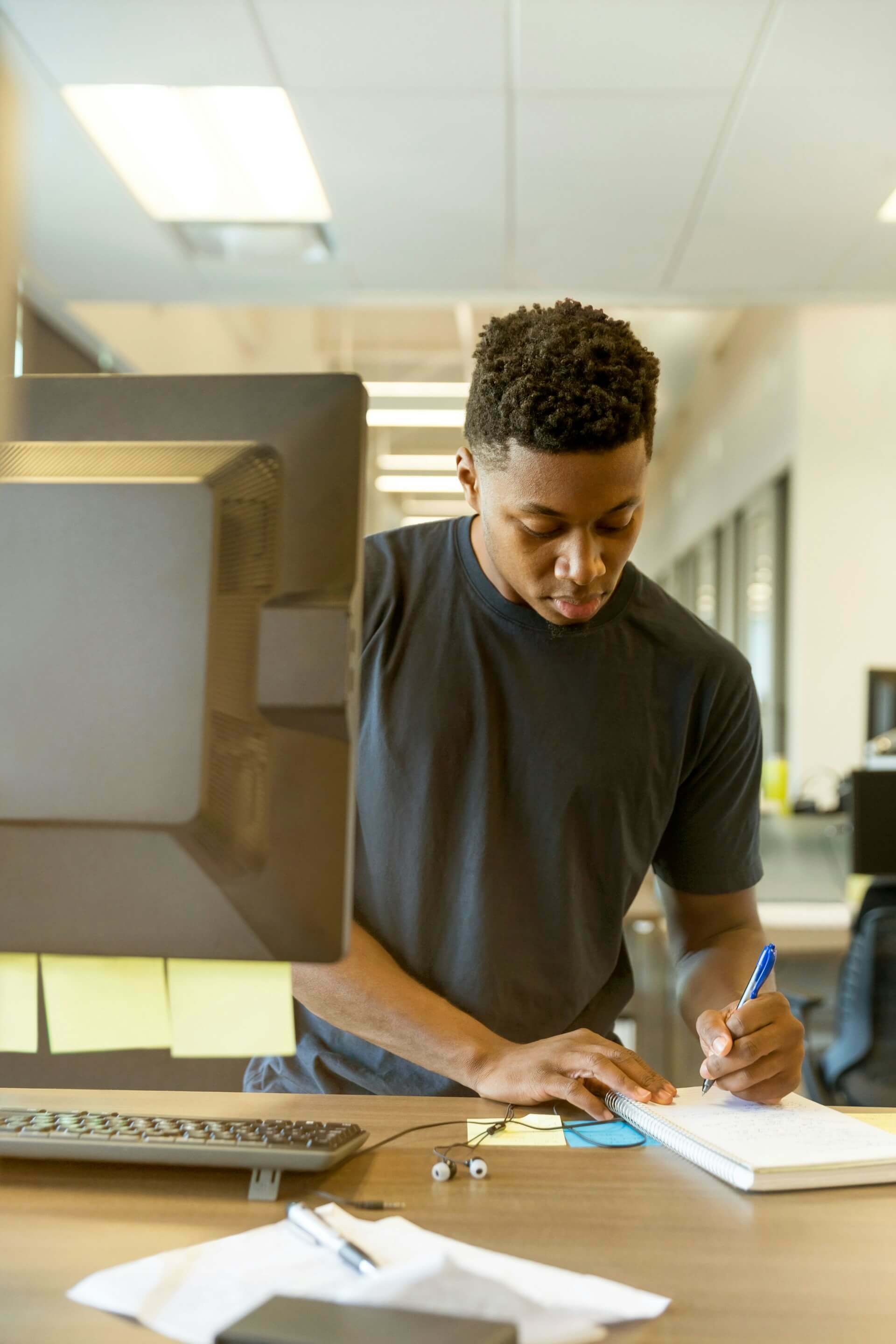 Student studying on computer in library